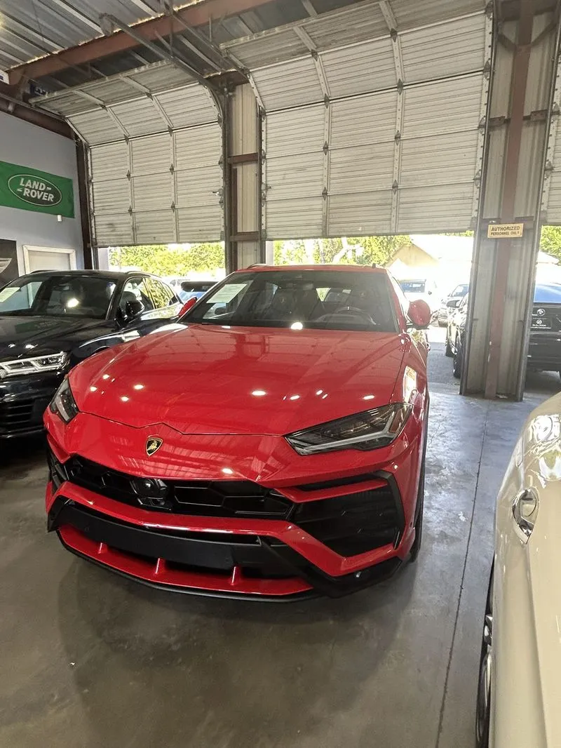 Ceramic coating gloss finish on red Lamborghini Urus, Elk Grove CA