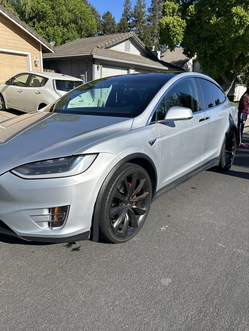Full exterior detail on silver Tesla Model X in driveway, mobile detailing Elk Grove CA