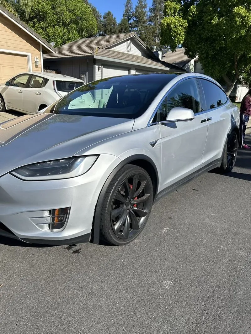 Full exterior detail on silver Tesla Model X in driveway, mobile detailing Elk Grove CA